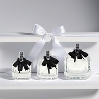 Design de luxe forme plate Unique 30ml/50ml/100ml flacons de parfum/huile en verre couvercle transparent nœud papillon noir vide parfum bouchon à vis