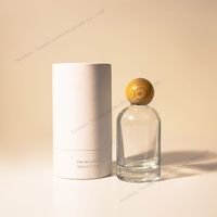 Vente en gros de flacons de parfum de luxe en verre cylindriques vides de 30 ml, 50 ml, 100 ml avec impression sérigraphique et pulvérisateur à pompe