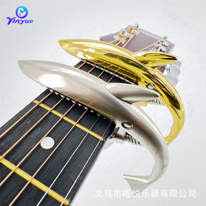 Capo para ukelele, abrazadera ajustable de plástico y acero para accesorios de guitarra y ukelele - Product Image 4