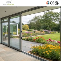 Porte coulissante élégante en aluminium de 22 mm avec verre insonorisé, installation sur rail encastré, isolation thermique moderne, extérieur et intérieur