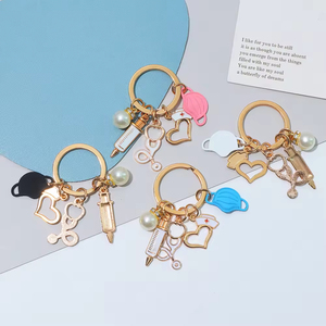 Portachiavi Creativo per Infermieri, Mascherina Medica, Siringa, Stetoscopio, Mini Portachiavi a Forma di Cuore, Regalo per Insegnanti di Medicina, Festa degli Infermieri - Product Image 1