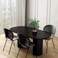 Nouvelle table à manger ovale moderne en bois massif noir 2026 pour petit appartement, mobilier de salle à manger de luxe léger