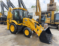 Traktor mini JCB 3CX 4CX bekas dengan muatan ujung depan dan backhoe retropendora