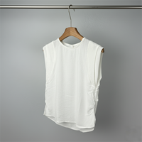 Chemise ample sans manches à volants à carreaux avec étiquette brodée OEM pour femmes, haut décontracté de couleur unie en mélange de coton et de lin