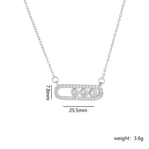 Collar con colgante de diseño exclusivo de circonita con forma de clip y dijes de imperdible de acero inoxidable - Product Image 4