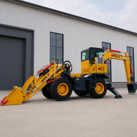 Chargeuse-pelleteuse, chargeuse frontale, chargeuse 4x4, machine d'excavation pour travaux de construction, travaux routiers, creusement de fossés, chargement, chantier