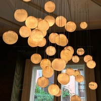 Lustre de villa sur mesure pour escalier, design simple et créatif, avec boules de verre LED personnalisées, installation pour salle à manger