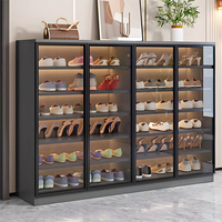 Meuble à chaussures moderne avec porte en verre pour entrée, unité de rangement modulaire élégante avec finition noire élégante et cadre en bois