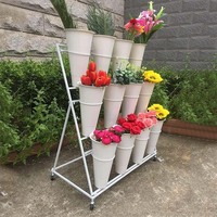 Le support de fleurs peut être personnalisé pour le magasin de fleurs