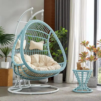 Fauteuil suspendu en rotin et métal en gros, chaise suspendue imperméable pour terrasse extérieure