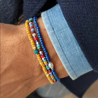 Bracelet extensible style bohème perles de riz, design Instagram, design color-block de niche, à porter en superposition, perles unisexe