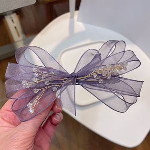 Vente en gros de pinces à cheveux en maille pour filles, nœuds en ruban de tulle, nœuds élégants de style Mori Girl pour femmes, accessoires pour cheveux - Product Image 2