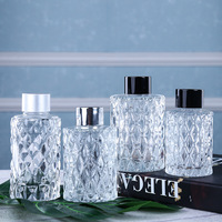 Vente en gros Bouteille vide en verre de diffuseur de parfum de forme ronde de couleur personnalisée transparente de 100ml 150ml 200ml avec couvercle