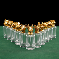 Flacon de parfum en verre transparent du zodiaque chinois unique de luxe de 50ml avec bouchon de pulvérisation en aluminium