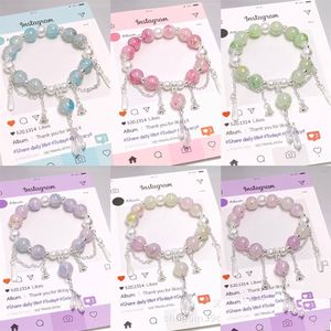 Pulsera de cuentas craqueladas de colores de moda con diseño de palomitas de maíz y dije de flor para mujer y niña - Product Image 1