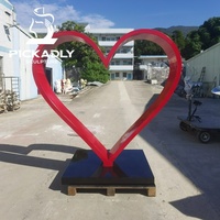 Grande sculpture en acier inoxydable pour l'extérieur, célèbre cœur d'amour rouge, sculpture d'amour en acier inoxydable