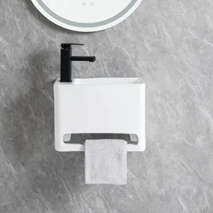 Bak cuci kamar mandi putih berkualitas wastafel porselen penjualan laris bak cuci tangan keramik Eropa dengan rak handuk