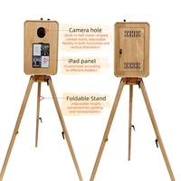 Photomaton rétro classique compatible avec les appareils photo reflex numériques et les iPad, adapté aux mariages et aux événements.