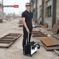 Machine de nettoyage au laser pulsé portable, à main, pour l'élimination de la rouille, de la peinture, de l'huile et de la graisse sur les surfaces métalliques et en acier