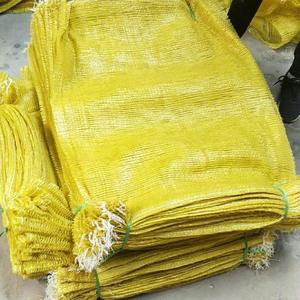プラスチック包装50kg50lbレッドオレンジグリーン空のPP管状織りベンチレーテッドロゴレノネットサックオニオンメッシュバッグポテト用