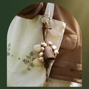 Wholesale Handcrafted Natural Fruit Shell Bag Charm Boho Seed Pod Mini <b>Wind</b> <b>Chime</b> For Gift And Bag Decoration - Product Image 4