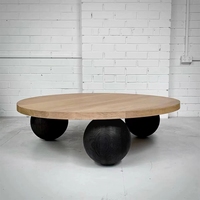 Table ronde moderne de luxe avec fond en boule de bois