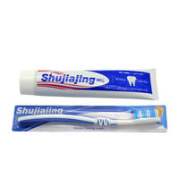 Dentifrice de qualité du fabricant personnalisé, dentifrice en gel rayé blanchissant les dents à saveur de menthe avec une brosse à dents emballée