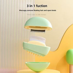 Venta caliente respetuoso con el medio ambiente 3 en 1 forma de concha de adoquines portátil peine para mascotas y cepillo de masaje de aseo con dientes de aguja - Product Image 3