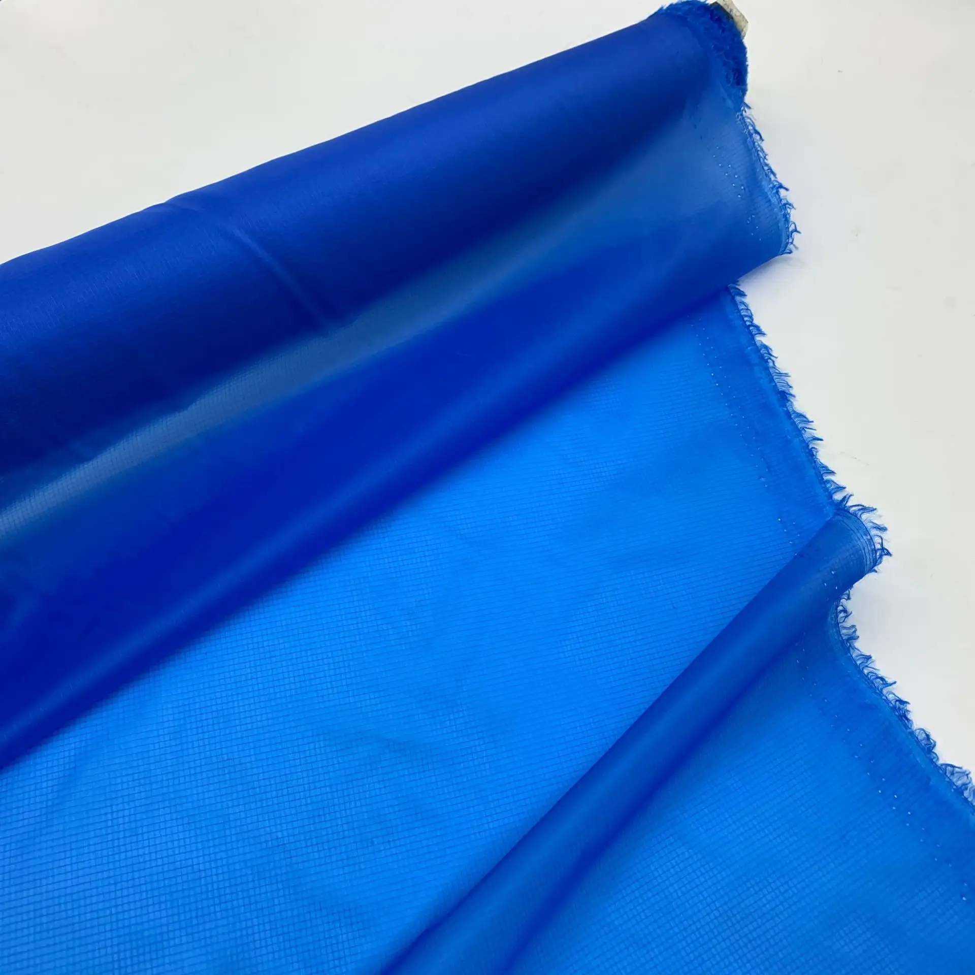 Nailon ripstop ultraligero con tela de nailon 10D impermeable a prueba de plumón para saco de dormir
