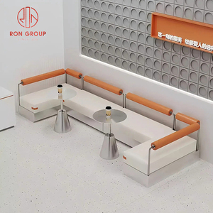 Set di Arredamento Commerciale per Ristoranti: Divano a L in Pelle Bianca per Caffetteria, Tavoli Rotondi in Metallo e Sedie Arancioni per Bar - Product Image 4