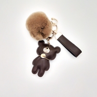 Porte-clés de luxe en cuir PU marron, petit porte-clés Bling, ours, avec pompon, vente en gros