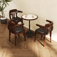 Retro-Stil Gewerbliche Möbel Esstische Stühle Set Holz-Leder-Stühle für Cafés Westliche Restaurants Milchtee-Läden