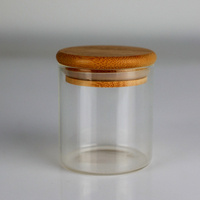 Chine vente en gros transparent fond rond simple bougie tasse bougie transparente vide bocal en verre emballage de luxe unique avec couvercle
