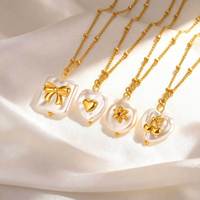 Collier tendance pour femme en acier inoxydable avec chaîne perlée, nœud et cœur plaqué or, imitation perle, idéal comme cadeau