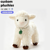 Peluche d'agneau sur pied personnalisée OEM avec pendentif trèfle à quatre feuilles, poupée en peluche d'agneau blanc bouclé pour cadeau d'enfant