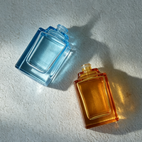 Flacon de parfum de luxe bleu et jaune ODM OEM, 30 ml, 50 ml, 100 ml, flacon de parfum en verre vide avec bouchon à bille