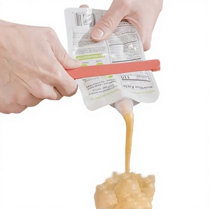 Exprimidor de Bolsas de Salsa Portátil, Herramienta Auxiliar de Cocina, Exprimidor de Tubos de Alimentos Reutilizable para Viajes y Uso Doméstico - Product Image 1