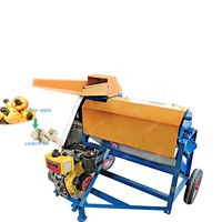 Machine de séparation et de traitement des noix de cajou