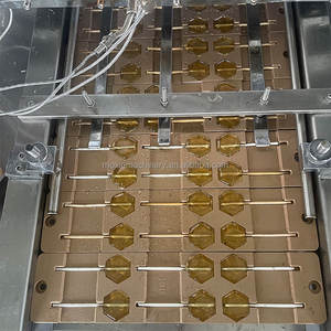 Machine automatique de dépose de bonbons en forme de petites boules de lait, gingembre et gélatine Moxin |   pour la fabrication de sucettes et de bonbons mous - Product Image 1