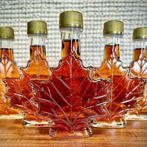 Vente en gros de flacons en verre pour sirop en forme de <span class=keywords><strong>feuille</strong></span> <span class=keywords><strong>d</strong></span>'érable de 50 ml <span class=keywords><strong>avec</strong></span> bouchon à vis, flacon en verre pour liqueur en forme de feuilles <span class=keywords><strong>d</strong></span>'érable de 100 ml <span class=keywords><strong>avec</strong></span> couvercle - Product Image 5