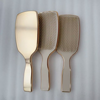 Brosse démêlante professionnelle populaire en chrome doré électroplaqué pour soins capillaires, personnalisable avec logo sur mesure