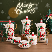 Service à thé de Noël en porcelaine plaqué or, un théière et deux tasses, idéal pour un cadeau de Noël