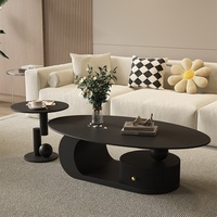 Table basse ovale moderne avec plateau en ardoise et structure en acier au carbone pour petits appartements et salons