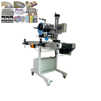 Machine automatique d'application d'étiquettes sensibles à la pression pour le miel, les sauces, les épices et les contenants alimentaires, y compris les bocaux en verre.