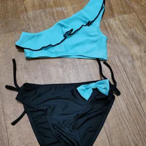 Clearing inventory stock of children's printed bikini sets, swimsuits, and children's swimsuits mixed at a cheaper price