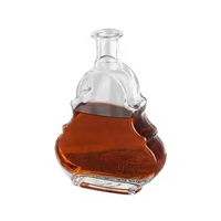 Bouteilles en verre vides personnalisées transparentes pour la validation des emballages de nouveaux produits (bourbon, vodka, spiritueux)