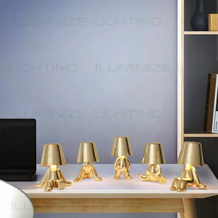A set of very interesting gold metal small thinker lamp collection usb rechargeable