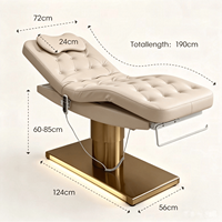 Table de massage électrique de luxe beige en promotion avec base dorée en acier inoxydable pour soins du visage et esthétique