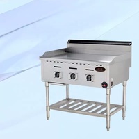 Grill à gaz commercial à 4 brûleurs en acier inoxydable avec surface plate pour cuisine de restaurant