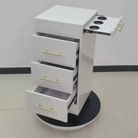Armoire de rangement à roulettes avec 4 tiroirs, poignées dorées, roulettes, finition noir mat pour salon de coiffure, barbier, spa, studio de manucure